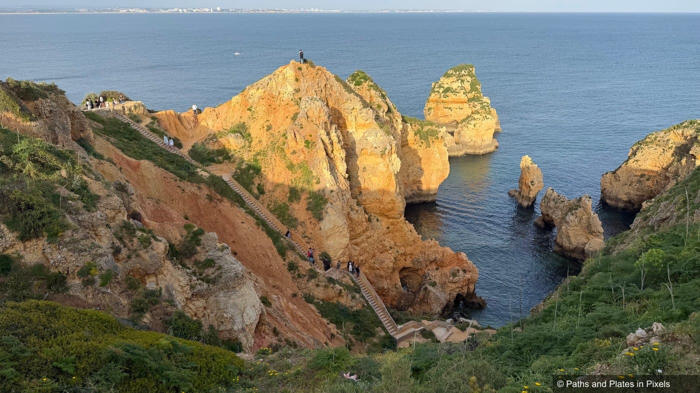 Jagged golden rock formations at Ponta da Piedade, Lagos
