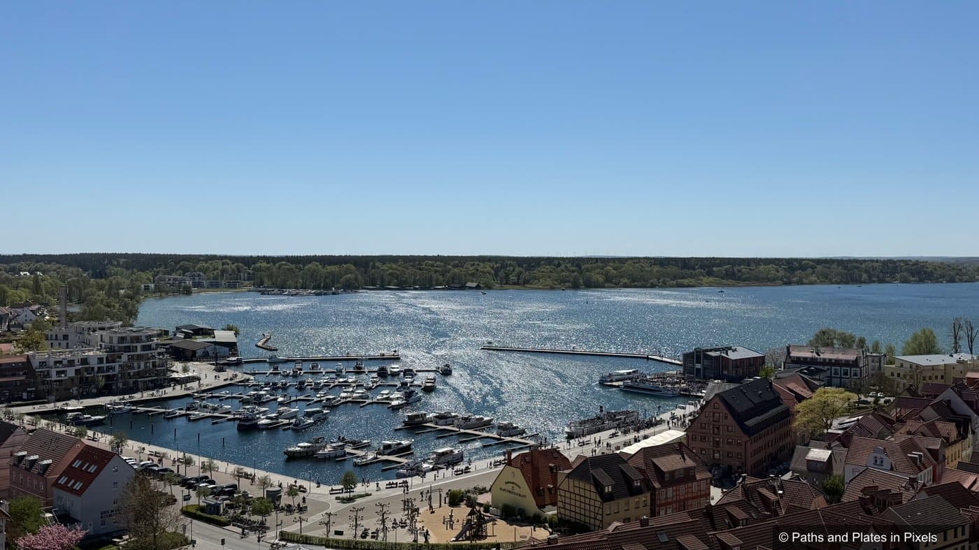 View south from the St. Mary Church tower over Waren harbour and Müritz lake